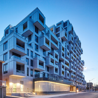 A view looking north along Cameron Street captures the cubic expression of the balconies. Photo by Scott Norsworthy.