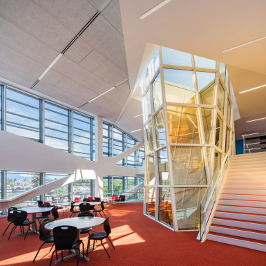 The “Vortex Lounge” at the Langara College Science & Technology Building arranges a series of lounge spaces that wrap vertically around a multistory oculus to draw students from all discipline together and create opportunities for students to collide and collaborate outside the formal teaching environment. Photo by Andrew Latreille.