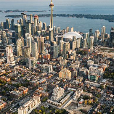 Aerial view of SQ at Alexandra park in the context of Toronto’s downtown financial district, with the CN Tower in the background. Photo by Michael Muraz.